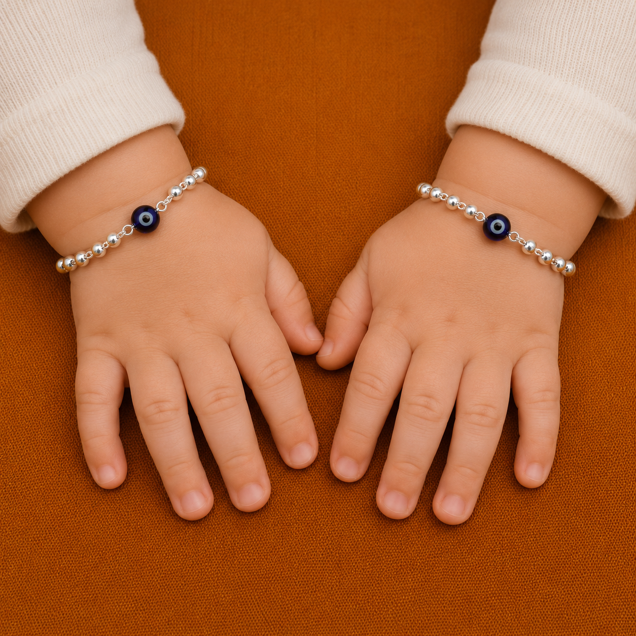 Silver evil eye bracelet with blue beads and sterling silver beads, designed for girls and kids, by TRIBAL ORNAMENTS.