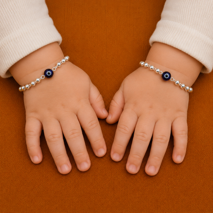 Silver evil eye bracelet with blue beads and sterling silver beads, designed for girls and kids, by TRIBAL ORNAMENTS.