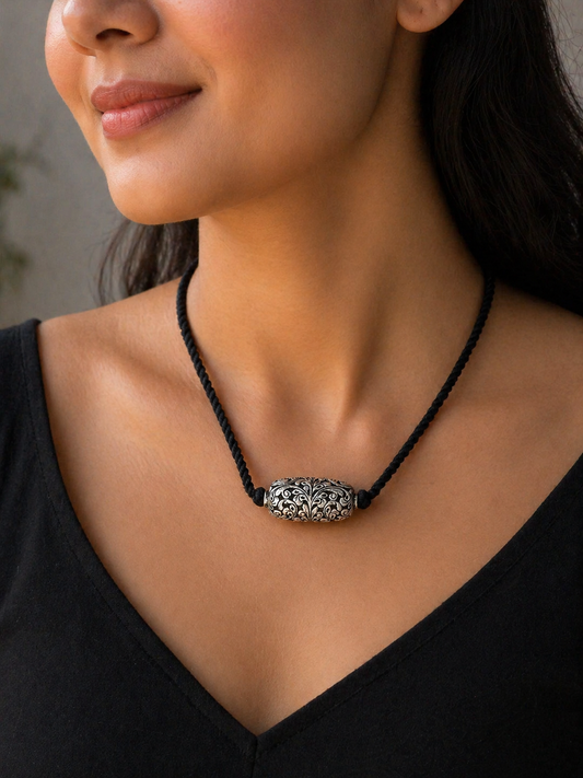 Vintage Indian tribal silver choker necklace with Chitai work pendant, showcasing traditional cultural design and intricate tribal jewelry details.