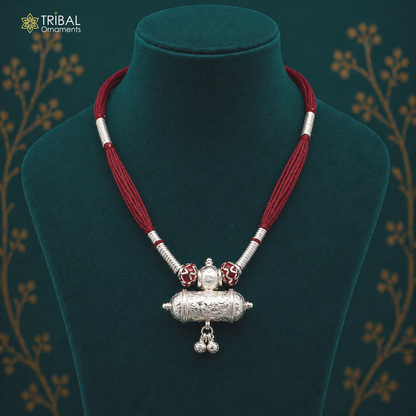 Vintage solid silver Indian wedding charm necklace with traditional tribal design, perfect for bridal jewelry and special occasions.