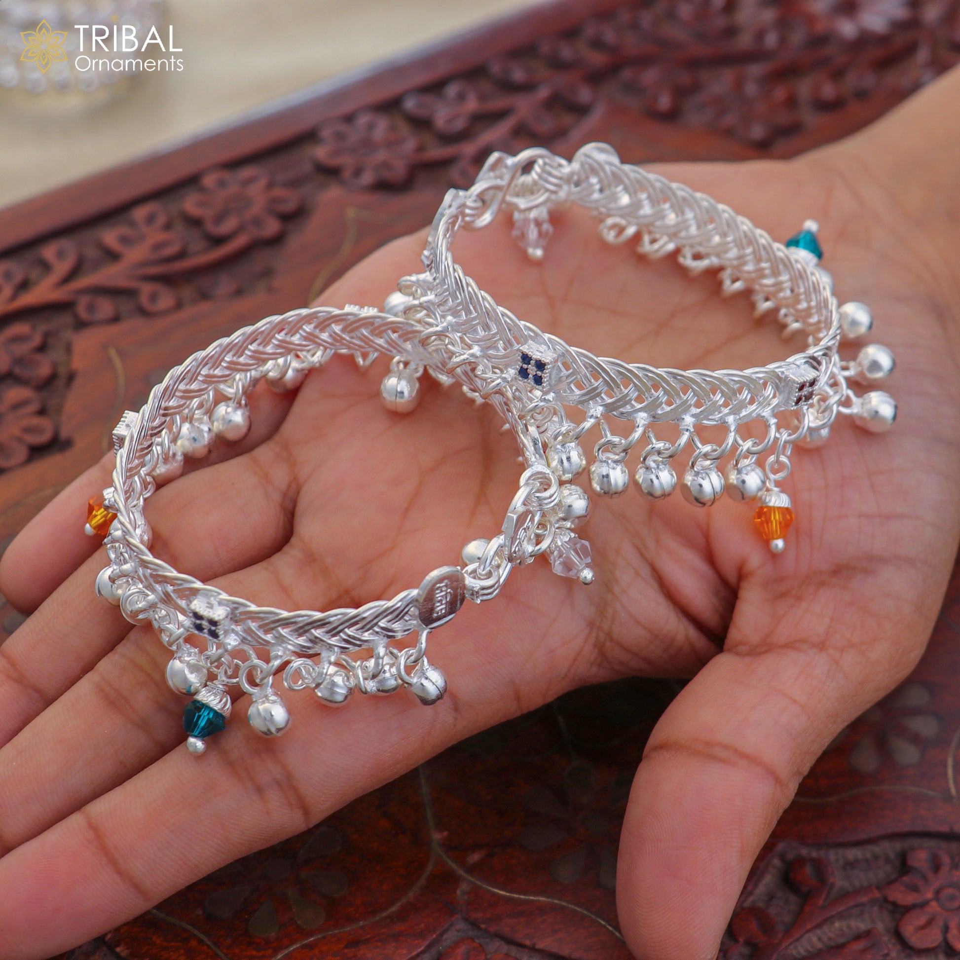 Sterling silver customized baby anklet with jingling charms from TRIBAL ORNAMENTS, delicate and suitable for gifting.