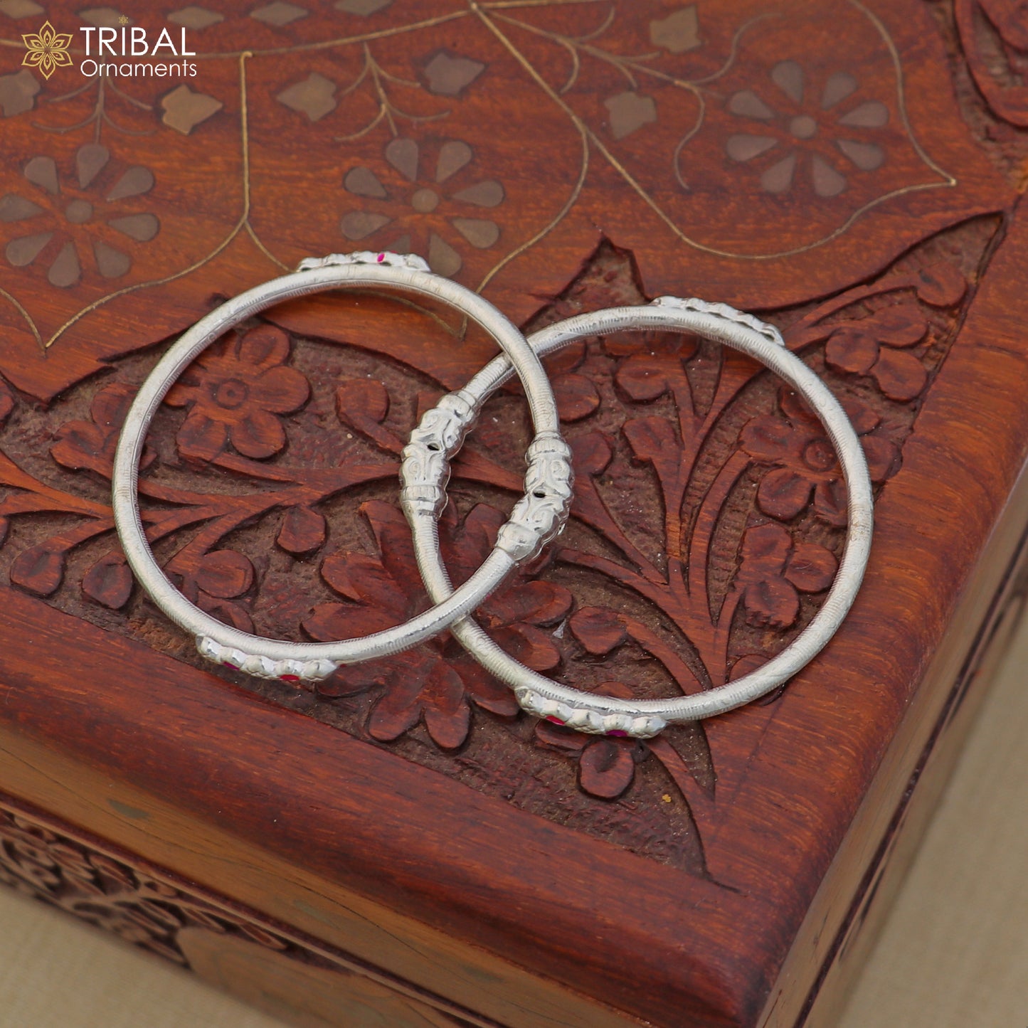 Sterling silver stylish baby bangle for kids jewelry by TRIBAL ORNAMENTS, featuring intricate design and smooth finish.
