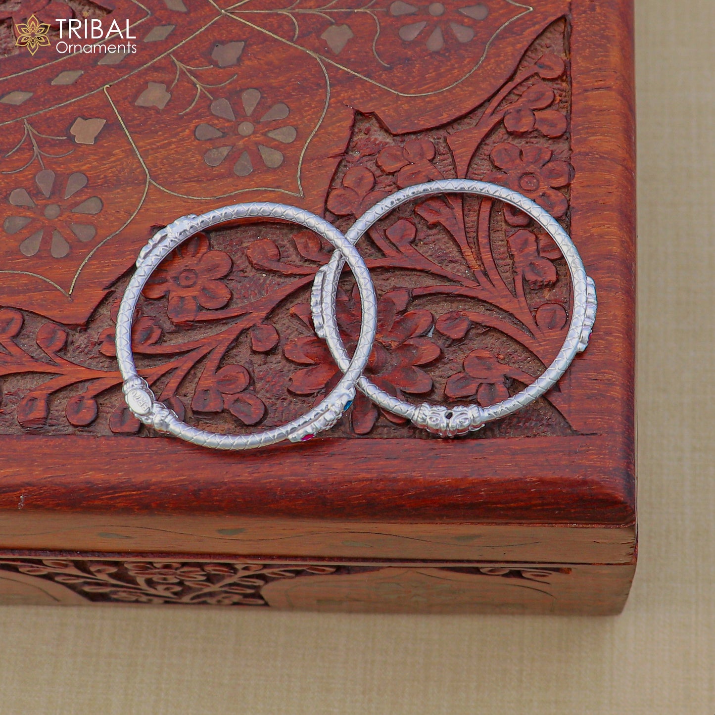 Sterling silver baby bangle Kada for kids jewelry, stylish design by TRIBAL ORNAMENTS, featuring a smooth, rounded bracelet for children