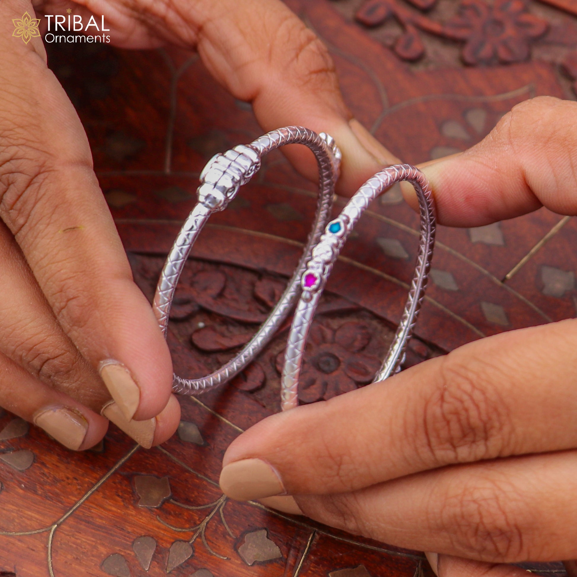 Sterling silver baby bangle for kids by TRIBAL ORNAMENTS, stylish and delicate jewelry with intricate design.