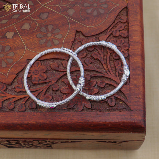 Sterling silver baby bangle kada for kids jewelry with stylish design by TRIBAL ORNAMENTS, featuring intricate craftsmanship.
