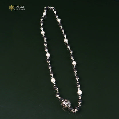 Vintage sterling silver necklace with pearl and karungali beads, featuring intricate tribal design by TRIBAL ORNAMENTS.