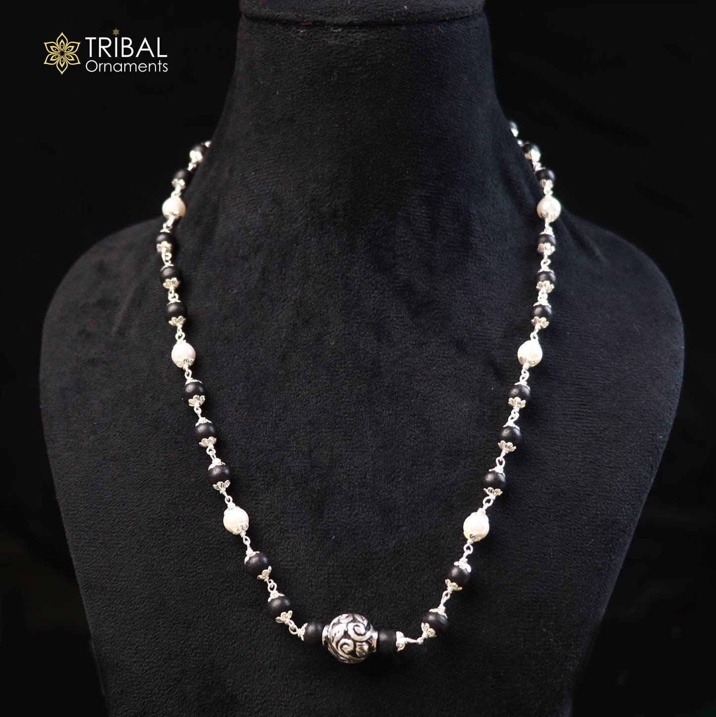 Vintage sterling silver necklace with pearl and karungali beads, featuring intricate tribal design by TRIBAL ORNAMENTS.
