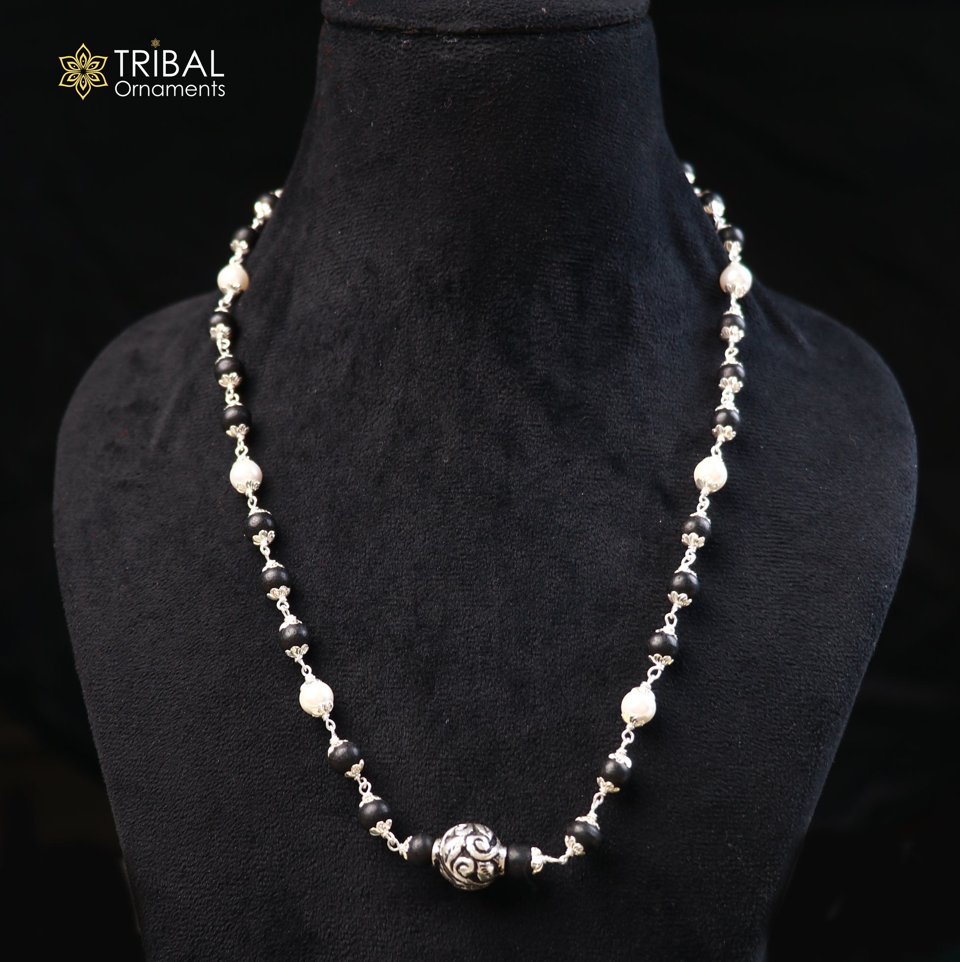 Vintage sterling silver necklace with pearl and karungali beads, featuring intricate tribal design by TRIBAL ORNAMENTS.