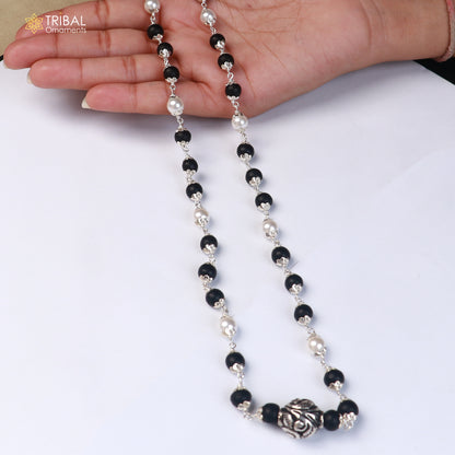 Sterling silver vintage necklace with pearl and karungali beads, featuring intricate tribal design by TRIBAL ORNAMENTS.