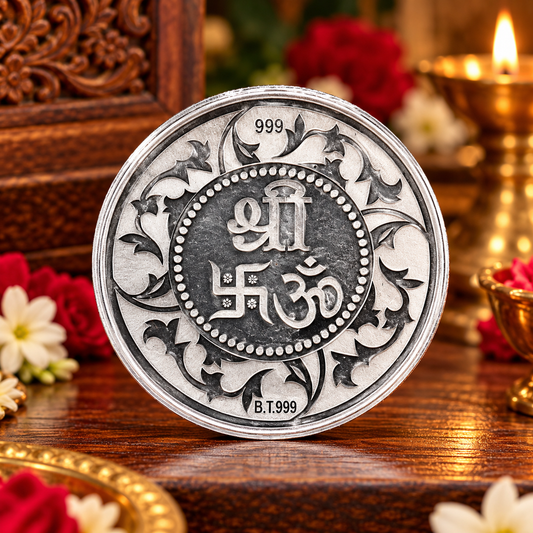 Silver coins featuring Ganesha, Lakshmi, and Saraswati, 100 grams, for Diwali, from Tribal Ornaments.