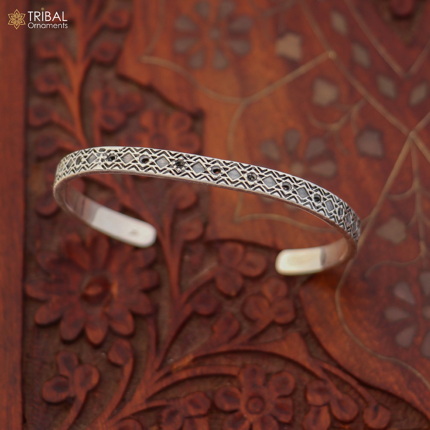 Stylish 925 sterling silver adjustable unisex bangle bracelet with sleek cuff design from Tribal Ornaments.