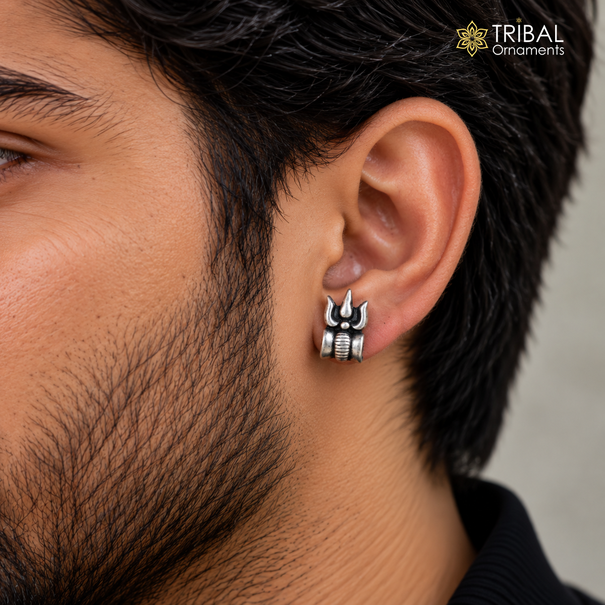 Sterling silver Mahakal trident design stud earring by TRIBAL ORNAMENTS, featuring intricate traditional motifs and a polished finish.