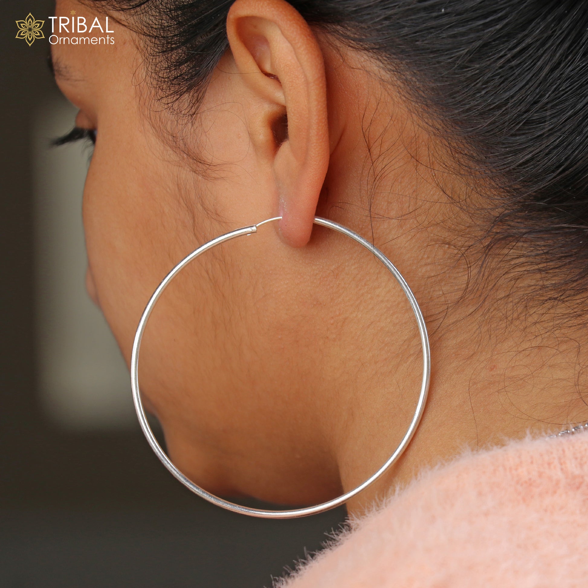 Elegant 925 sterling silver round hoops earrings featuring a polished finish, from TRIBAL ORNAMENTS jewelry collection.