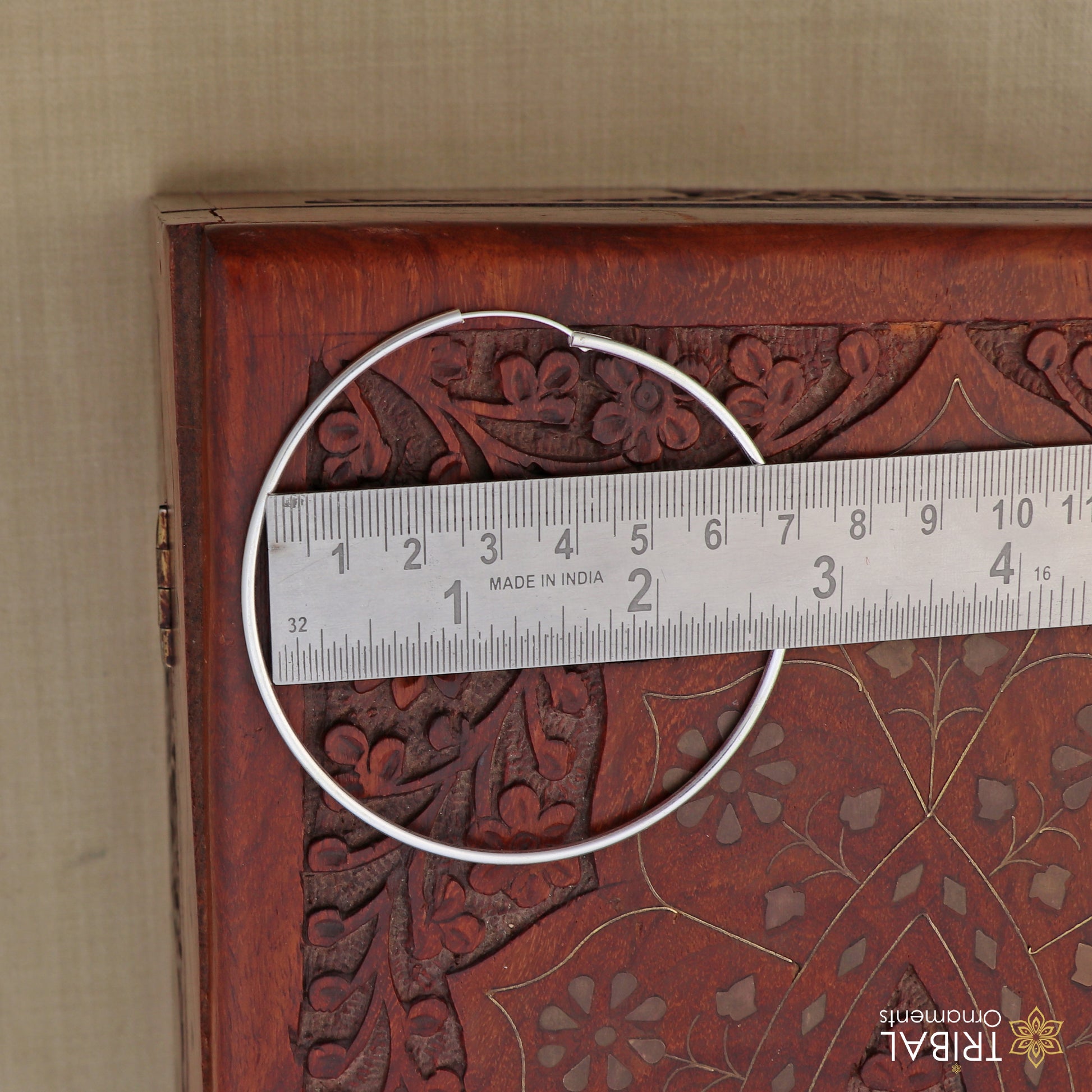 925 sterling silver round hoops earrings by TRIBAL ORNAMENTS with a polished, elegant finish, perfect for everyday jewelry.