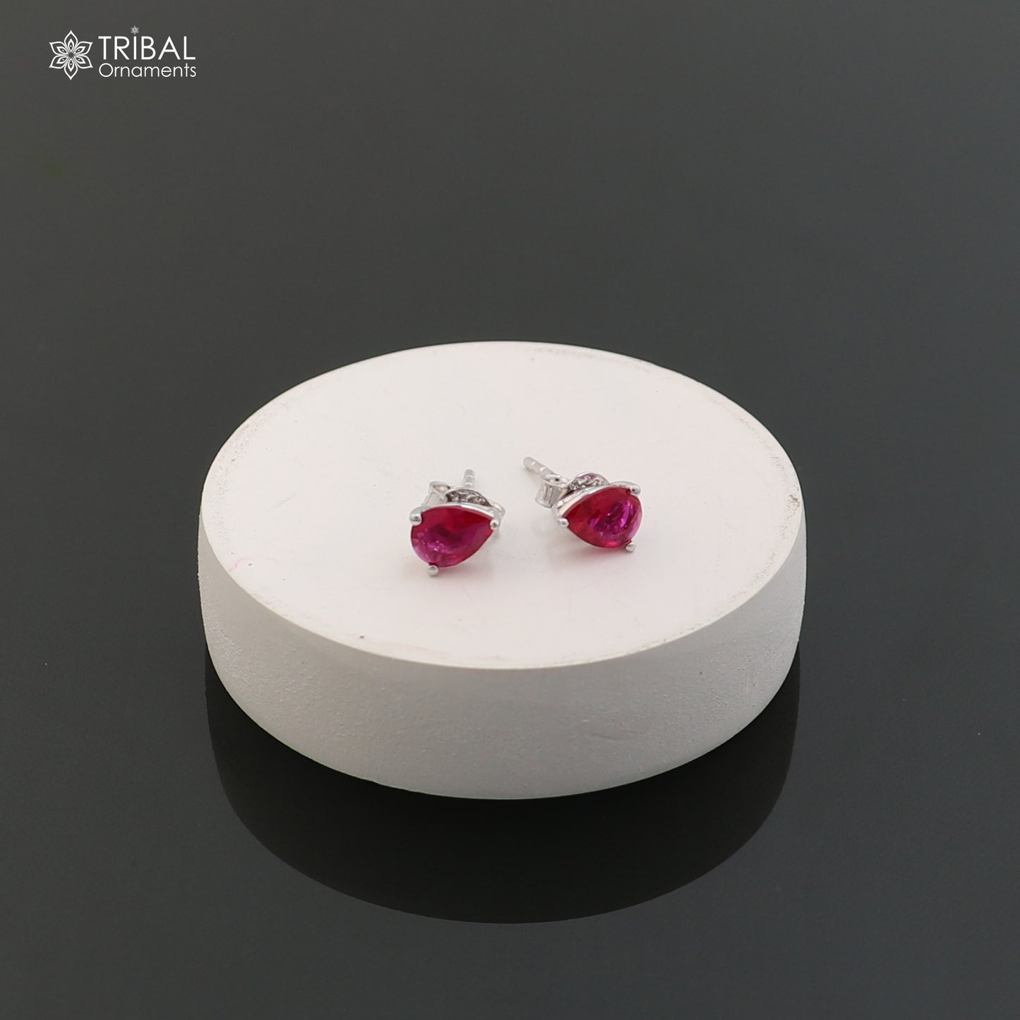 Sterling silver oval stone stud earring by TRIBAL ORNAMENTS, unisex jewelry with polished finish and elegant design.