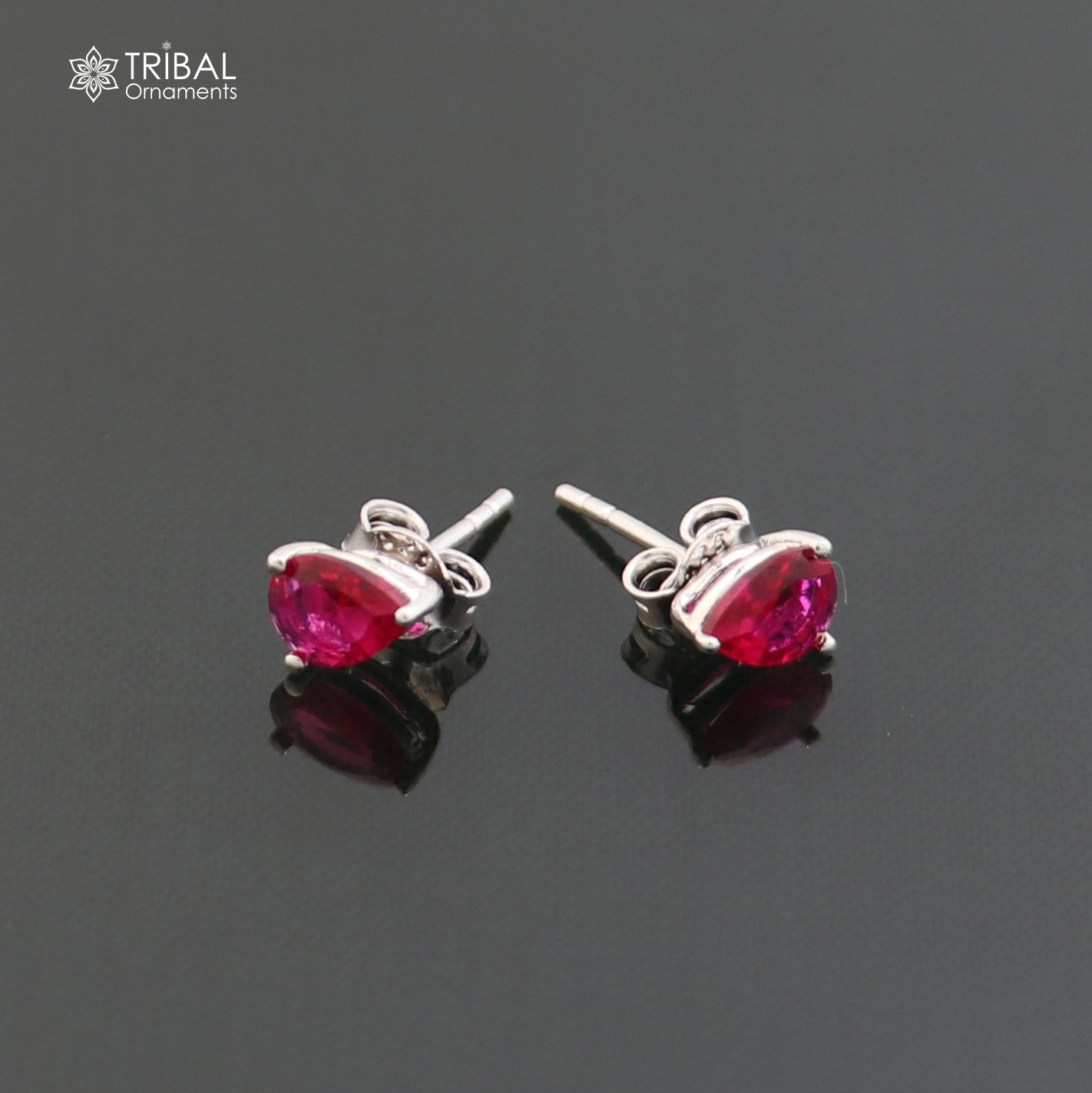 Sterling silver oval-shaped stone stud earring by TRIBAL ORNAMENTS, showcasing a polished unisex jewelry design.