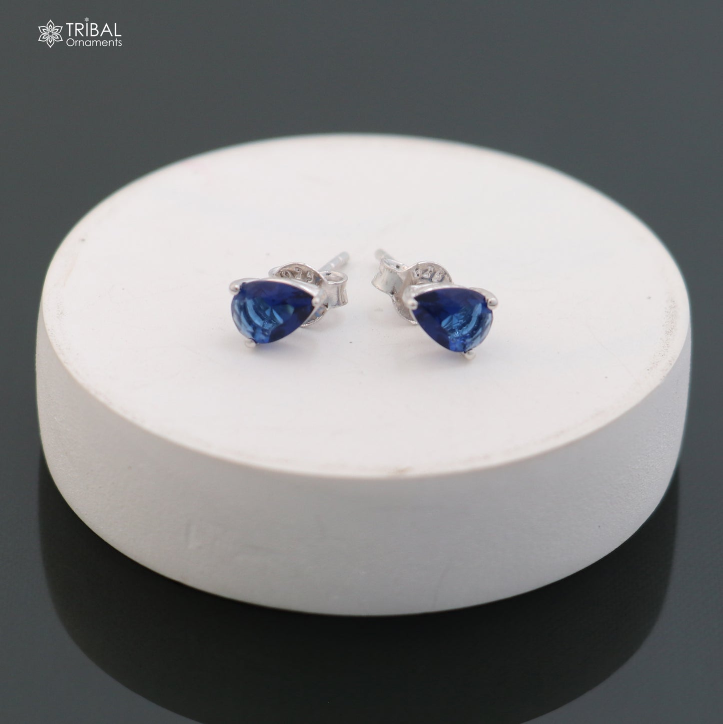 925 sterling silver oval-shaped stone stud earring by TRIBAL ORNAMENTS, showcasing a polished gemstone in a sleek, unisex jewelry design.