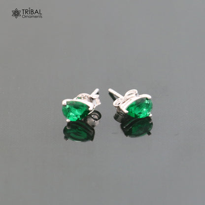 925 sterling silver oval stone stud earring by TRIBAL ORNAMENTS, unisex jewelry with a polished oval gemstone setting.