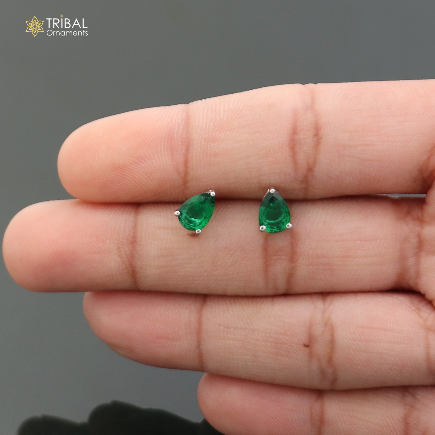 Sterling silver oval stone stud earring by TRIBAL ORNAMENTS, unisex jewelry with polished finish and elegant design.