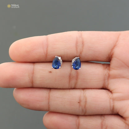 Sterling silver oval-shaped stone stud earring by TRIBAL ORNAMENTS, unisex jewelry with polished silver finish and elegant design.