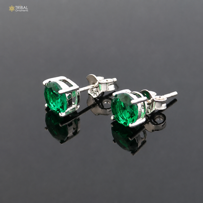 Sterling silver round green stone stud earring by TRIBAL ORNAMENTS, unisex jewelry with polished finish and classic design.