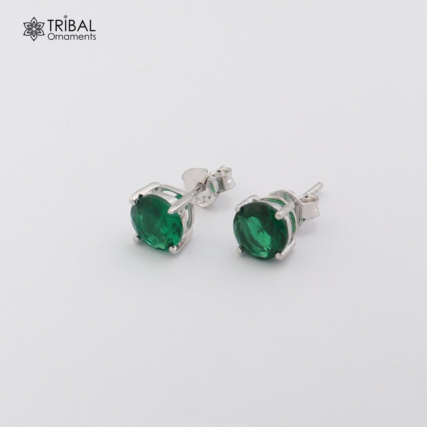 925 sterling silver round green stone stud earring by TRIBAL ORNAMENTS, showcasing a polished green gemstone in a sleek silver setting