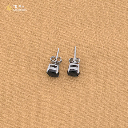 925 sterling silver round black stone stud earring, unisex jewelry by TRIBAL ORNAMENTS, shown with a close-up of the design.