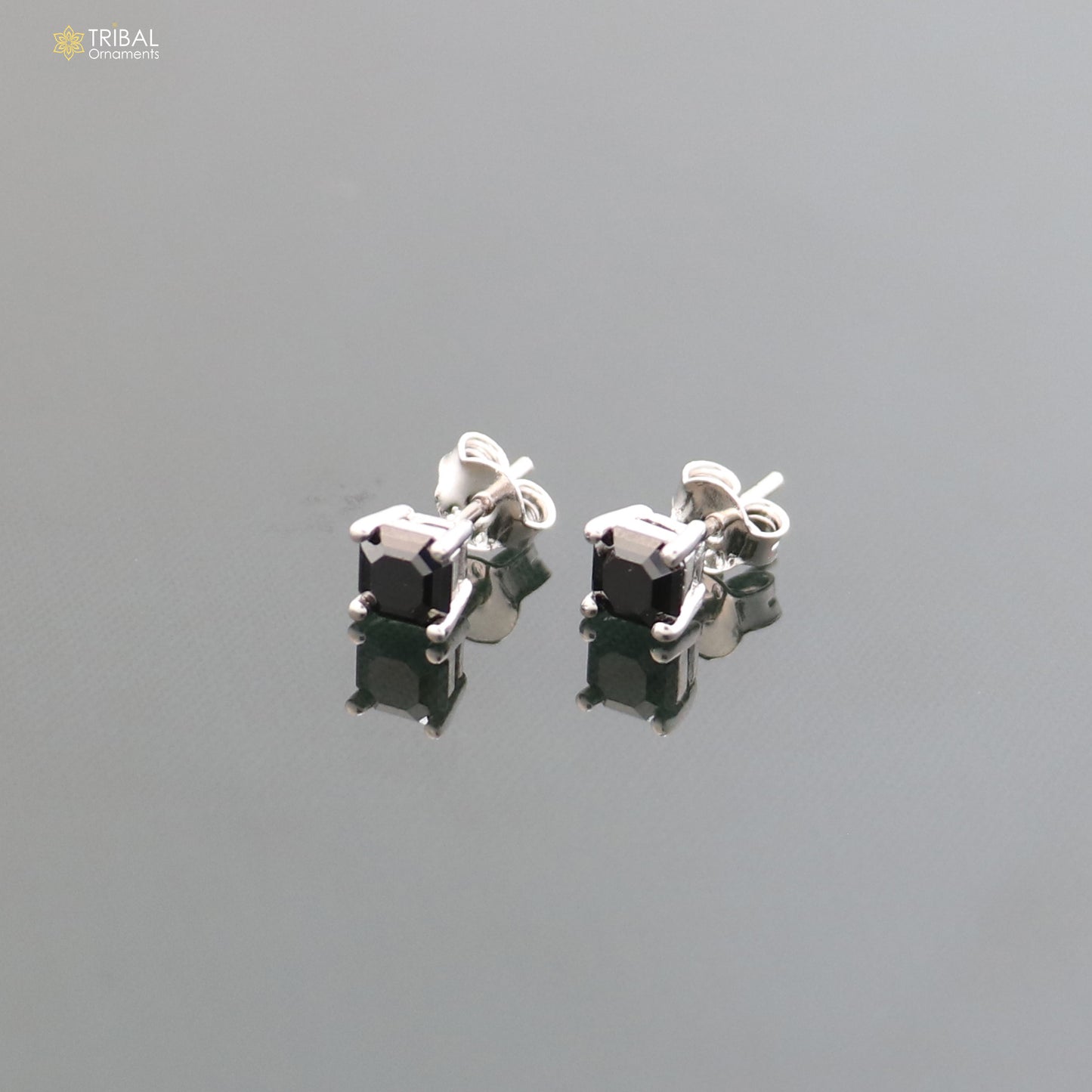Unisex 925 sterling silver square black stone stud earring by TRIBAL ORNAMENTS, showcasing sleek geometric design and polished finish.