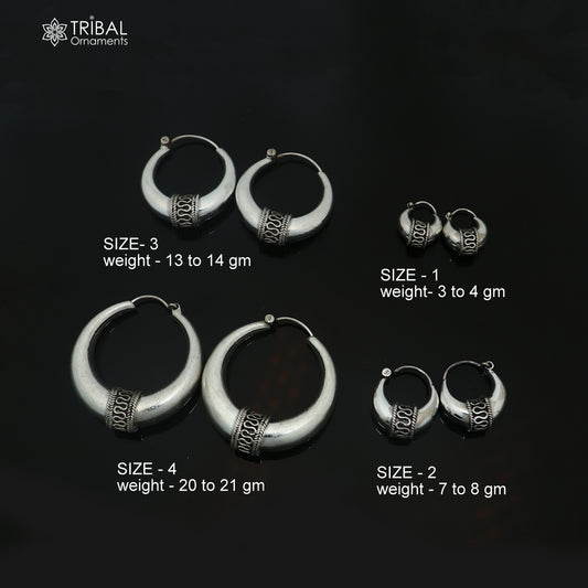Shiny 925 sterling silver plain hoop earrings, unisex jewelry by TRIBAL ORNAMENTS, showcasing smooth, polished circular hoops.