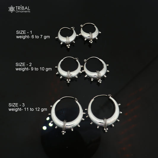 Shiny 925 sterling silver stylish hoop earrings, unisex jewelry, elegant and modern design by TRIBAL ORNAMENTS.