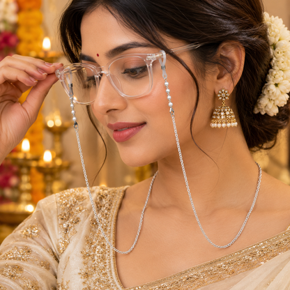 Sterling silver Cuban link chain by Tribal Ornaments, stylish eyeglass and mask chain for women, shown with sunglasses and face mask.