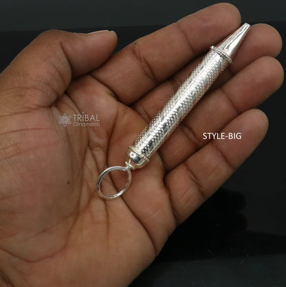 Colorful 925 sterling silver water gun Pichkari for HOLI festival, featuring vibrant designs and intricate craftsmanship by TRIBAL ORNAMENTS.