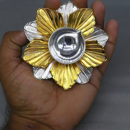 Silver flower design oil lamp by TRIBAL ORNAMENTS, 925 pure silver home temple deepak with intricate floral decoration.