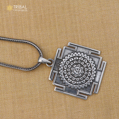 Sterling silver Shree Kal Bhairav Yantram pendant with chain, tribal jewelry design, crafted by TRIBAL ORNAMENTS in image nsp1115_4.jpg.