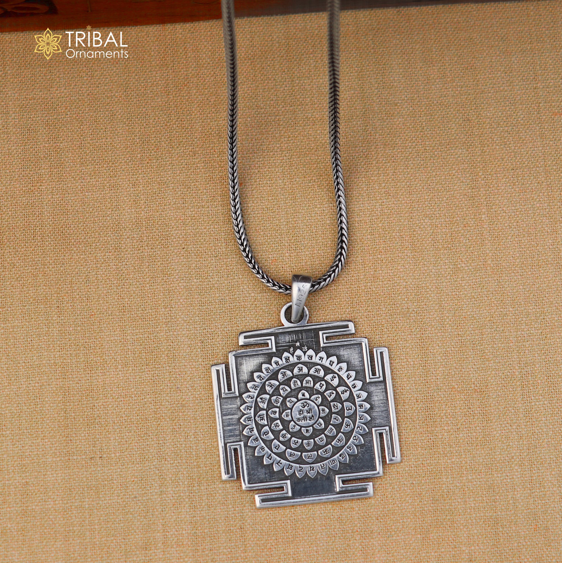 925 sterling silver Shree Kal Bhairav Yantram pendant with chain, tribal jewelry design, detailed religious symbol.