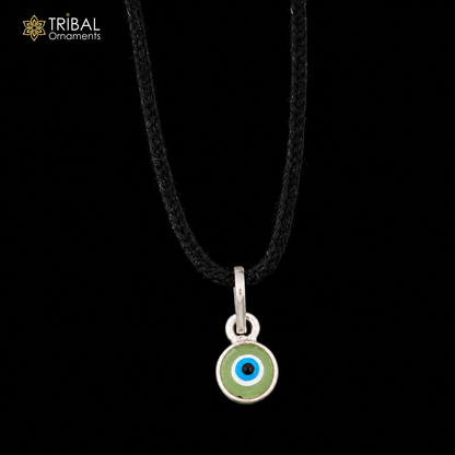 Sterling silver evil eye pendant for girls and kids, protective jewelry by TRIBAL ORNAMENTS, featuring a detailed evil eye design.