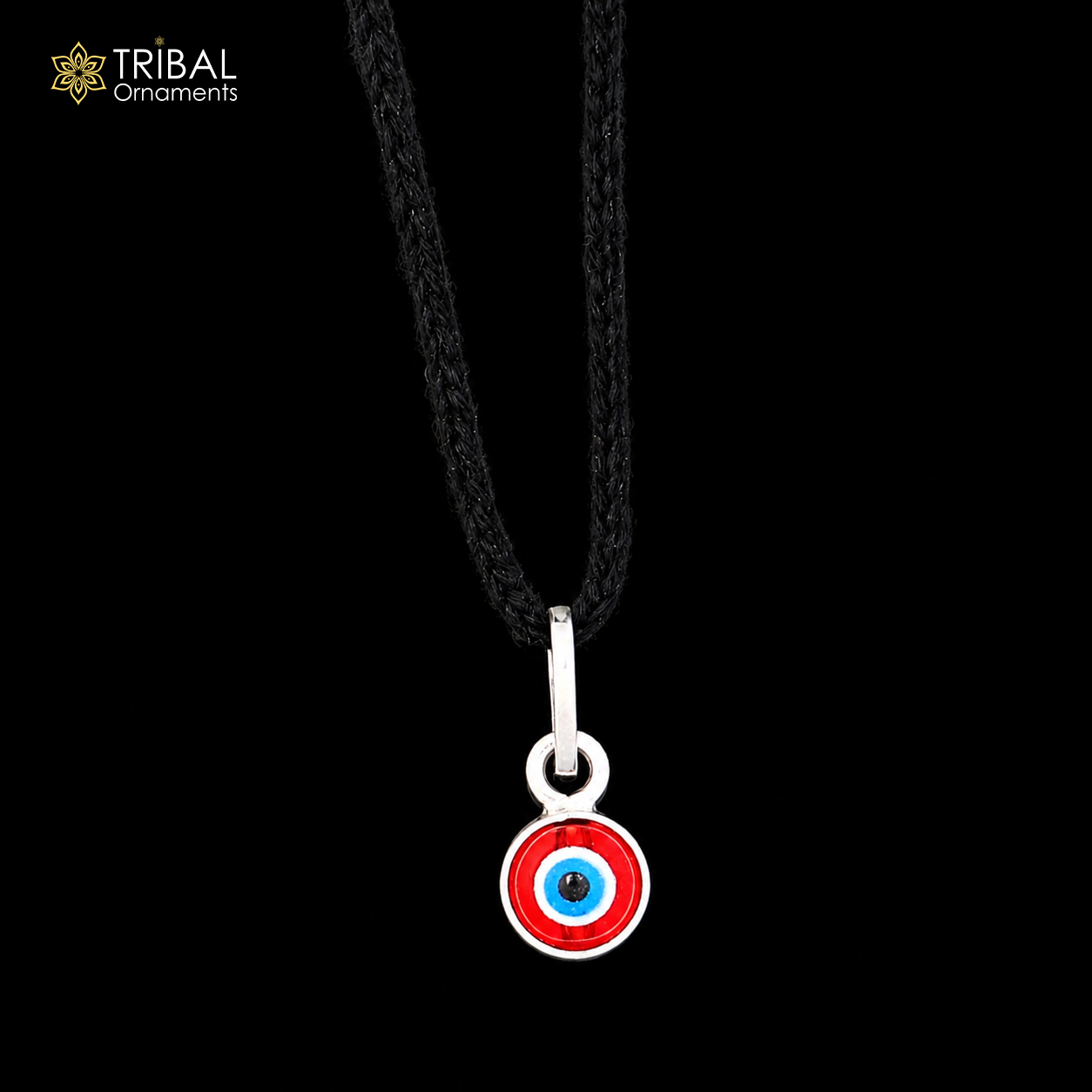 Sterling silver evil eye pendant for girls and kids, protective jewelry by TRIBAL ORNAMENTS, featuring blue eye design.