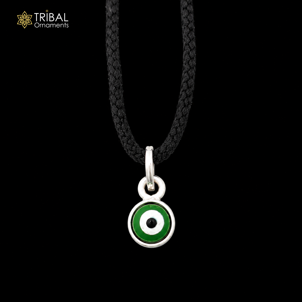 Sterling silver evil eye pendant for girls and kids, protective jewelry by TRIBAL ORNAMENTS, featuring a blue and white evil eye design.