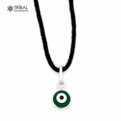Sterling silver evil eye pendant for girls and kids, protective jewelry featuring a detailed evil eye design by Tribal Ornaments