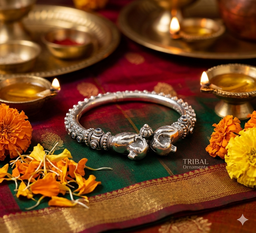 925 sterling silver peacock design cubic zirconia bangle bracelet with intricate detailing by TRIBAL ORNAMENTS.
