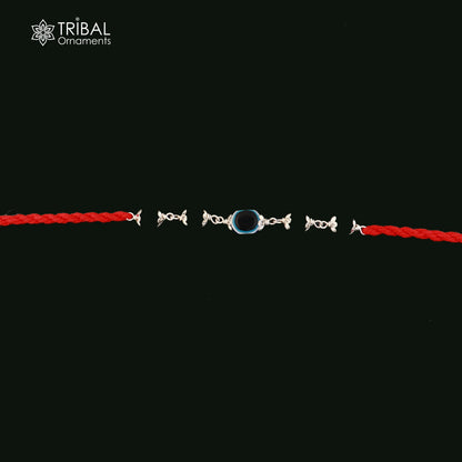 Sterling silver KARUNGALI and evil eye beads red thread rakhi bracelet with intricate tribal design, handmade by Tribal Ornaments.