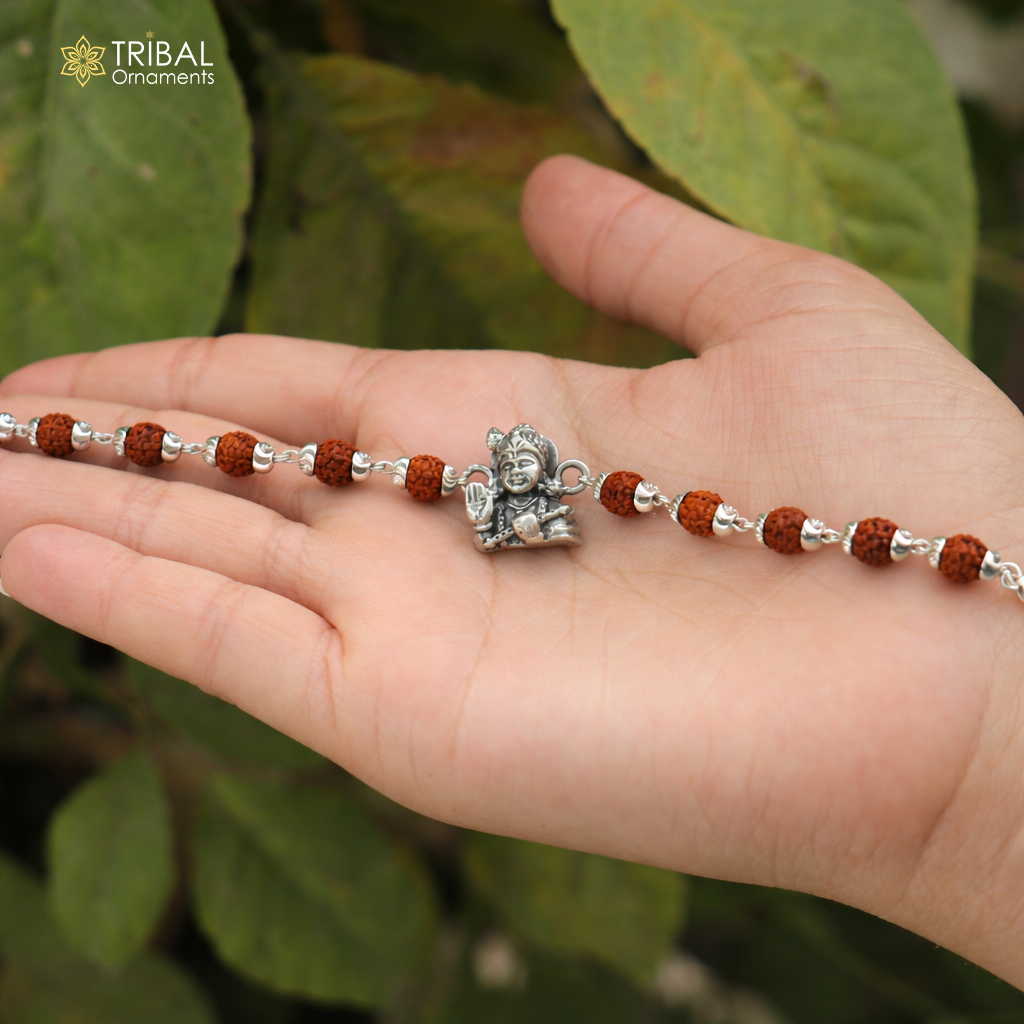 Sterling silver Lord Krishna bracelet with intricate design, personalized gift from TRIBAL ORNAMENTS, model rk239.
