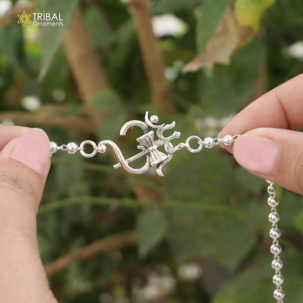 925 sterling silver Om Rudraksha bracelet with black and white Tulsi beads and silver accents, traditional Rakhi design.