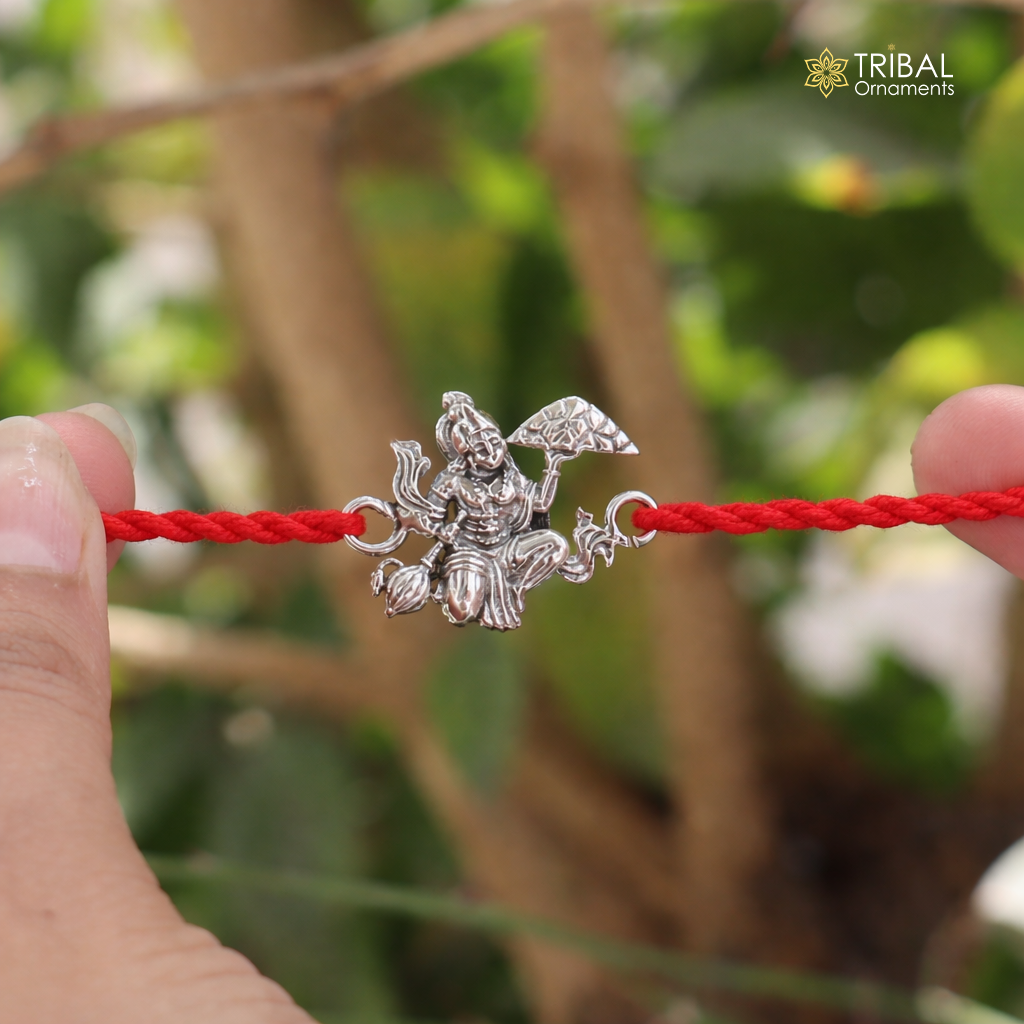 925 Sterling silver Lord Hanuman thread rakhi bracelet with intricate design from TRIBAL ORNAMENTS, featuring detailed Hanuman motif.
