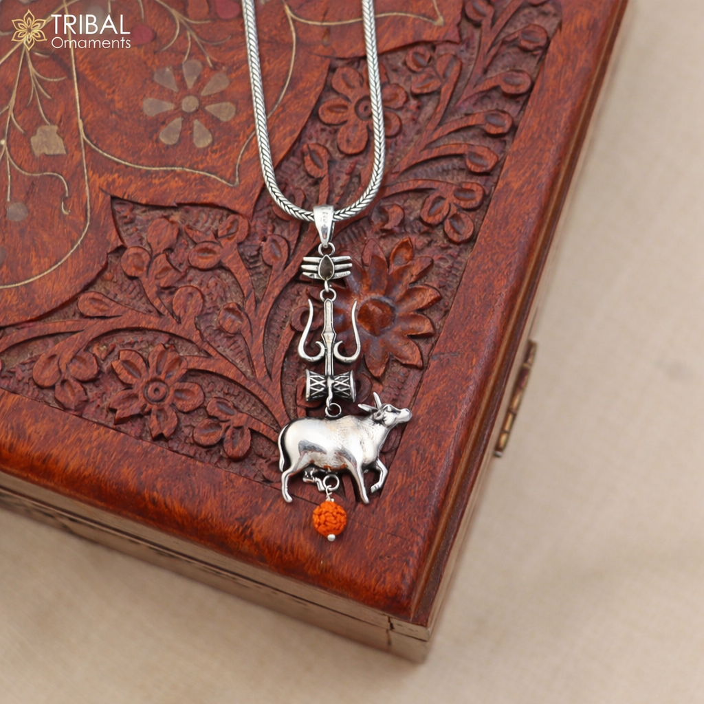 925 sterling silver Shiva trident pendant with damru and Nandi design, showcasing intricate craftsmanship from TRIBAL ORNAMENTS.