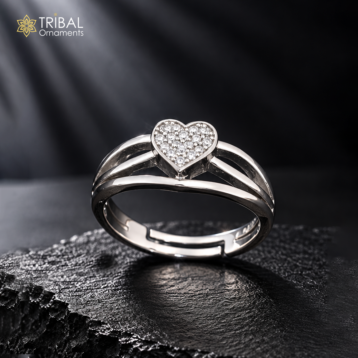 Sterling silver heart design CZ stone ring by TRIBAL ORNAMENTS, featuring a detailed heart-shaped centerpiece and polished band.