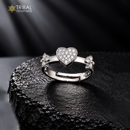Sterling silver heart design CZ stone ring by Tribal Ornaments, featuring a polished band and sparkling cubic zirconia accents.