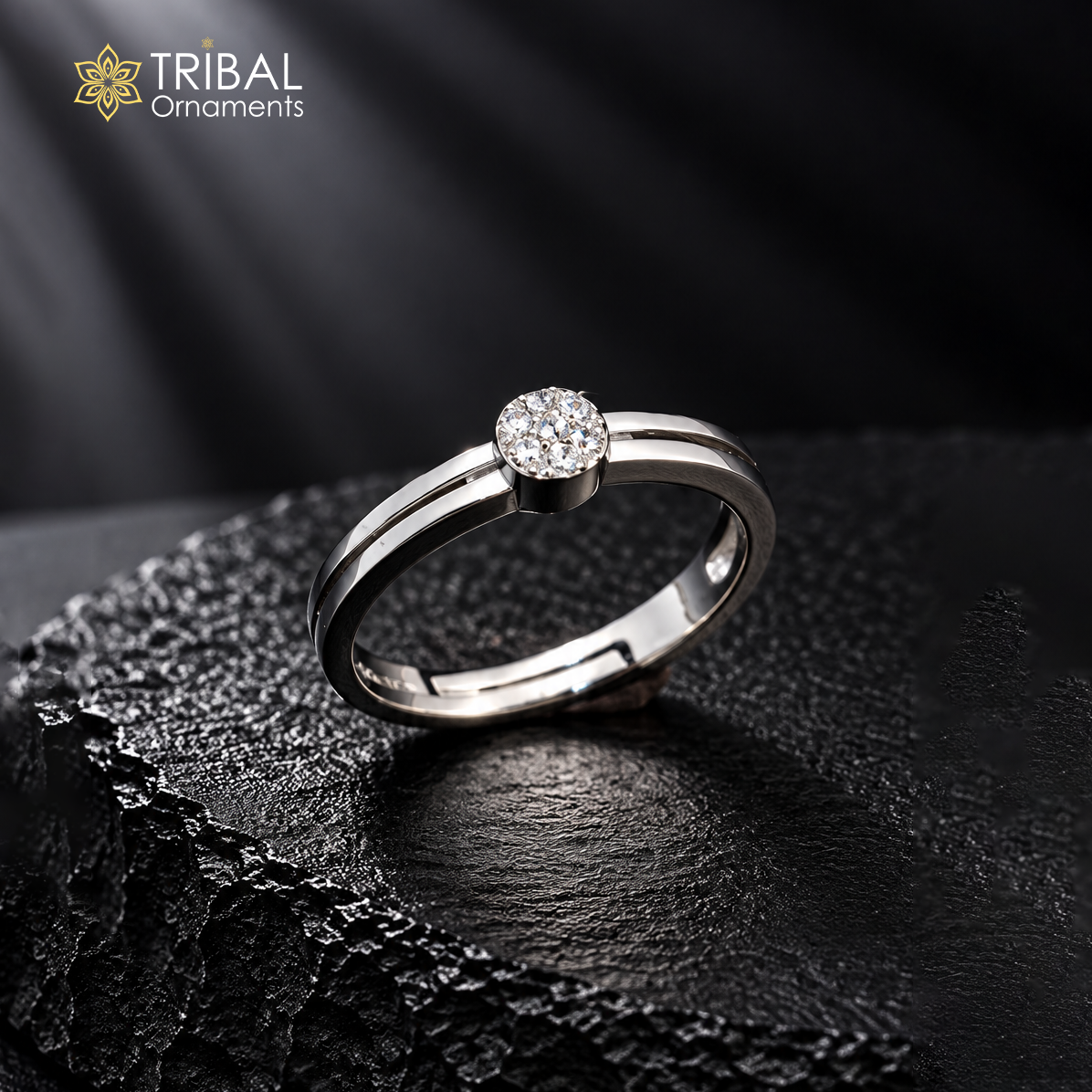 Sterling silver stylish CZ stone ring by TRIBAL ORNAMENTS featuring a polished band and sparkling cubic zirconia accents.