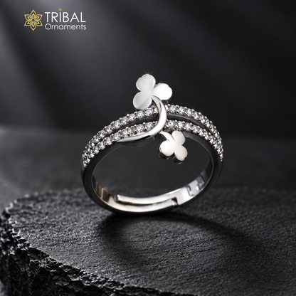 Sterling silver flower-style CZ stone ring by TRIBAL ORNAMENTS with intricate floral design and sparkling stones.