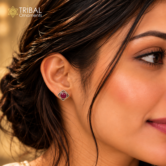 Sterling silver pink stone stud earring by TRIBAL ORNAMENTS, unisex jewelry, close-up of the pink gemstone on a silver stud setting.